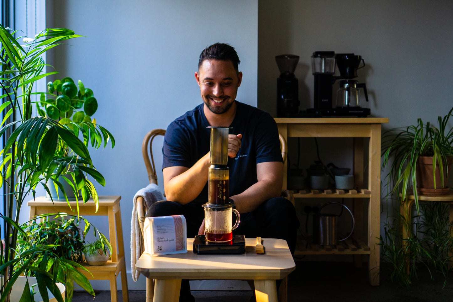 Charlie watches on with a smile as the Aeropress works its magic on Sow coffee.